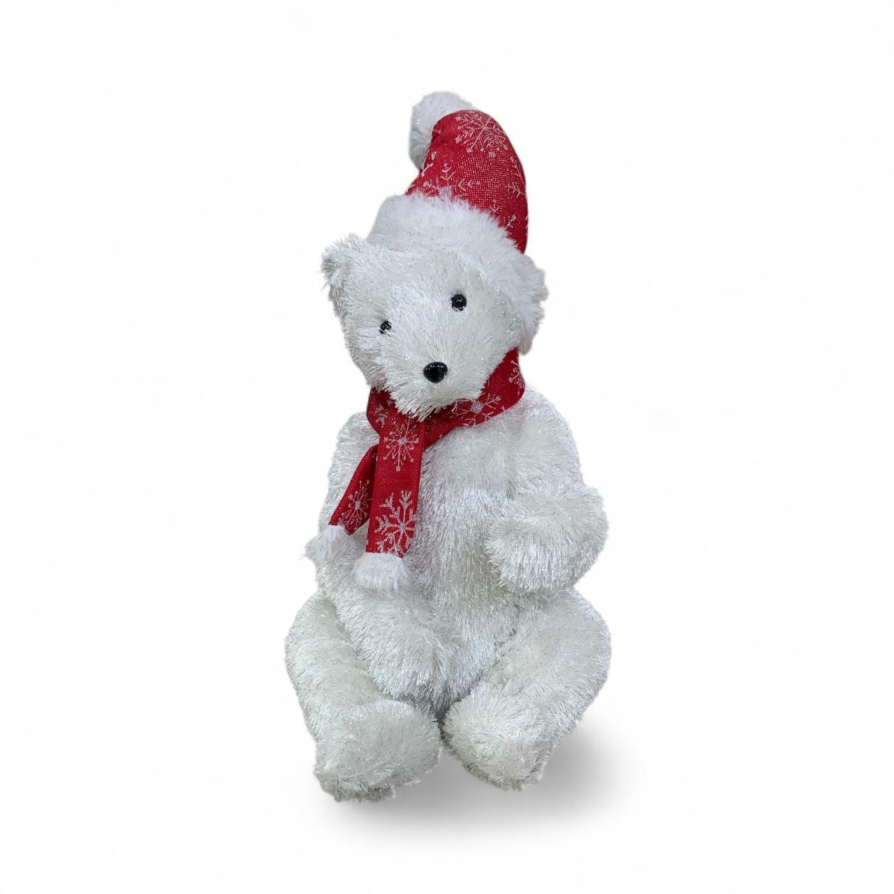oso polar bufanda roja sentado